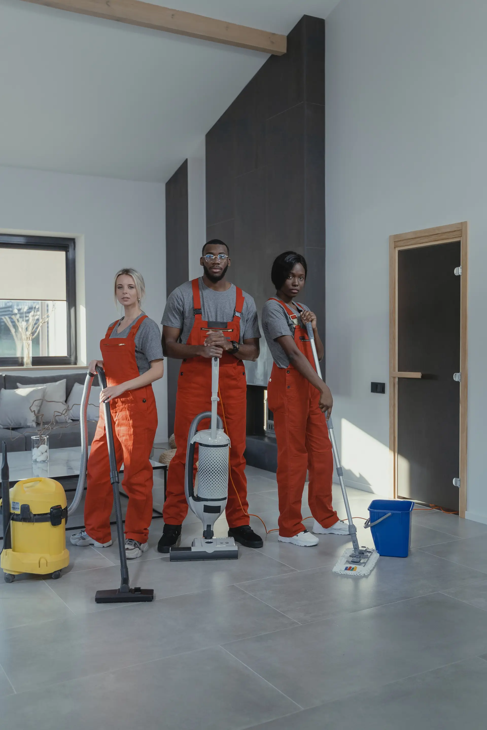 Professional cleaning team in a modern Manchester home